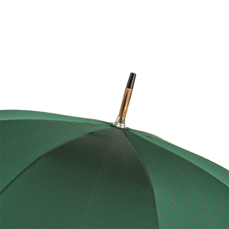 Top of the green canopy with wooden tip and black ferrule