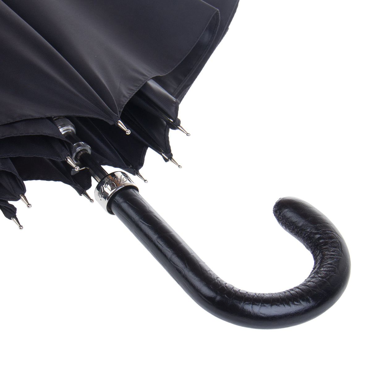 Black leather crook handle and silver-tone rib tips of the Pasotti cane umbrella — 478-OXFORD/11