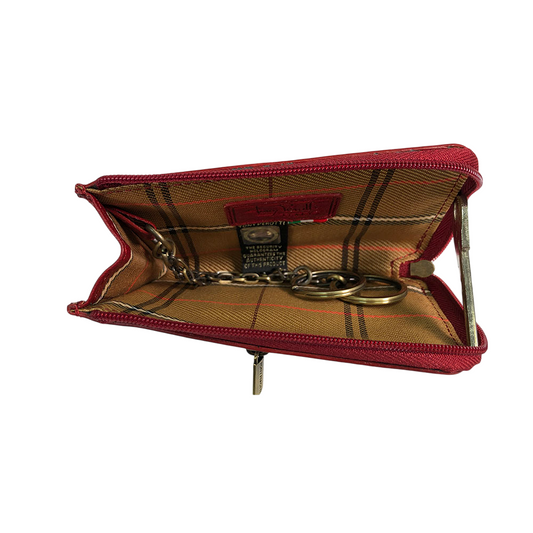 Red leather key case opened flat with woven check lining, key rings on chains and Tony Perotti hologram tag — Italico 1941L rosso