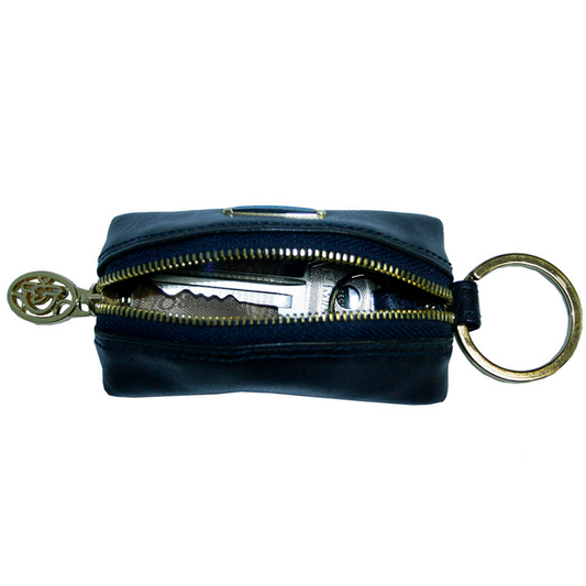 Tony Perotti Topkapi KR-186 navy — the case unzipped with a car key and fob inside, showing the light grey lining and the split ring on its leather tab
