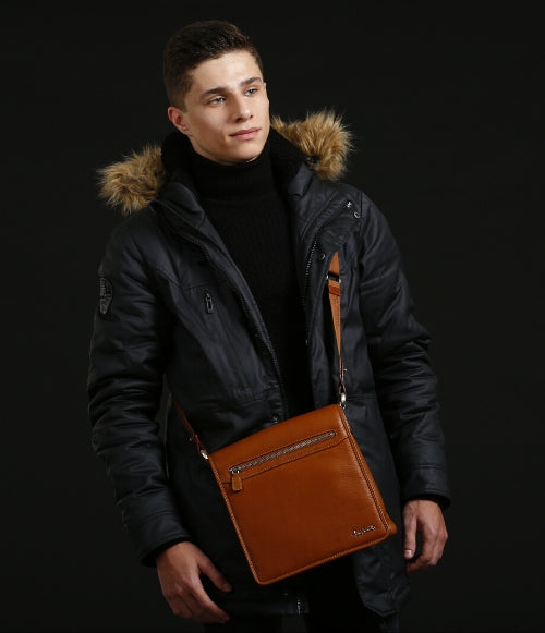 The guy with the ginger leather Tony Perotti bag with the shoulder handle