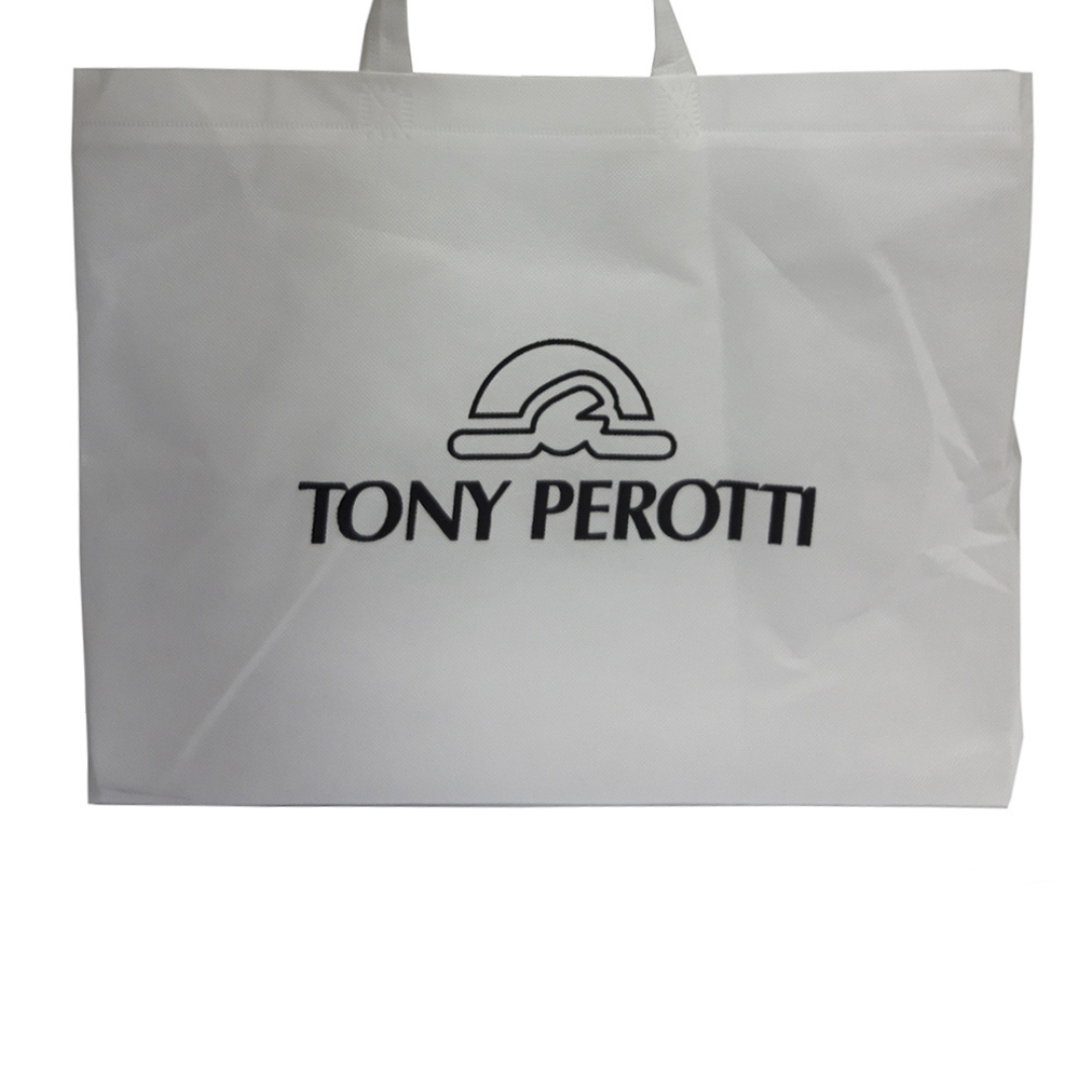 The white Tony Perotti textile bag the New Contatto 9058 crossbody bag is packed in