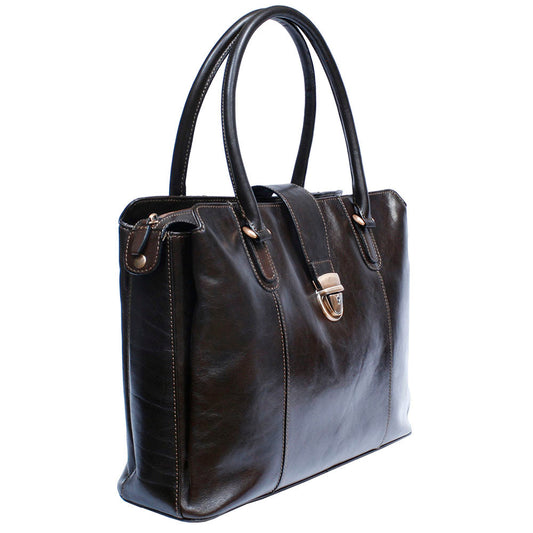 Tony Perotti Italico 9715 moro leather laptop bag at an angle — contrasting beige stitching along the panels, bronze handle brackets and the zip of the centre compartment