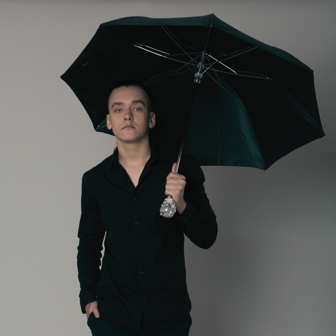 The guy with the Pasotti silver lion umbrella