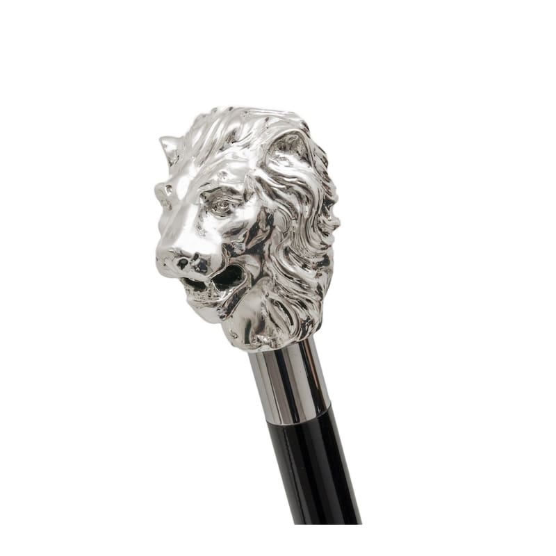 Shoe horn handle in the form of a silver lion's head
