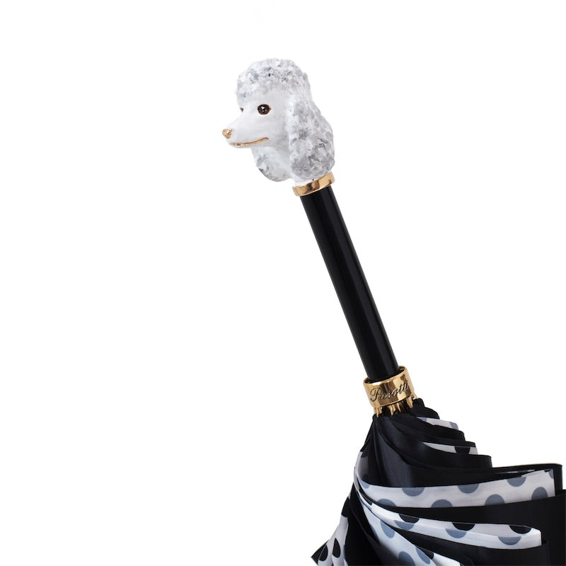 The poodle-shaped handle of Pasotti's luxurious umbrella - 1
