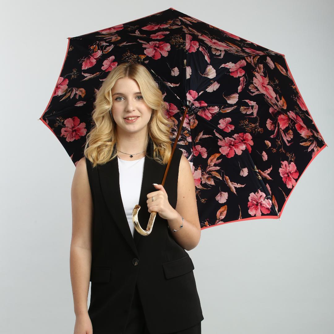 Girl with beautiful Pasotti Magnolia Spring coral women's umbrella 2