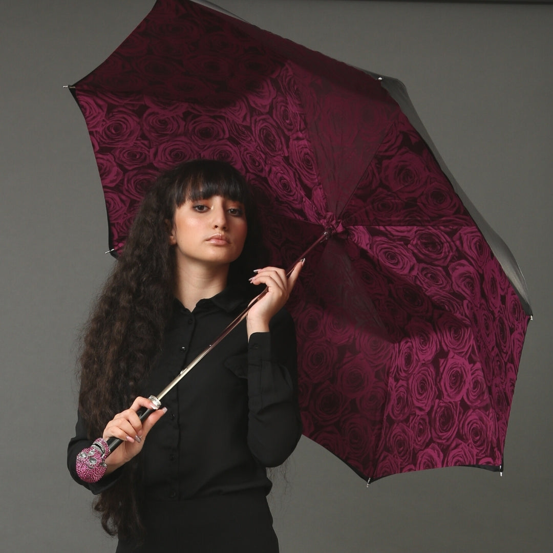 The girl is holding an umbrella with a skull with roses under the dome and a handle with Swarovski crystals - 4
