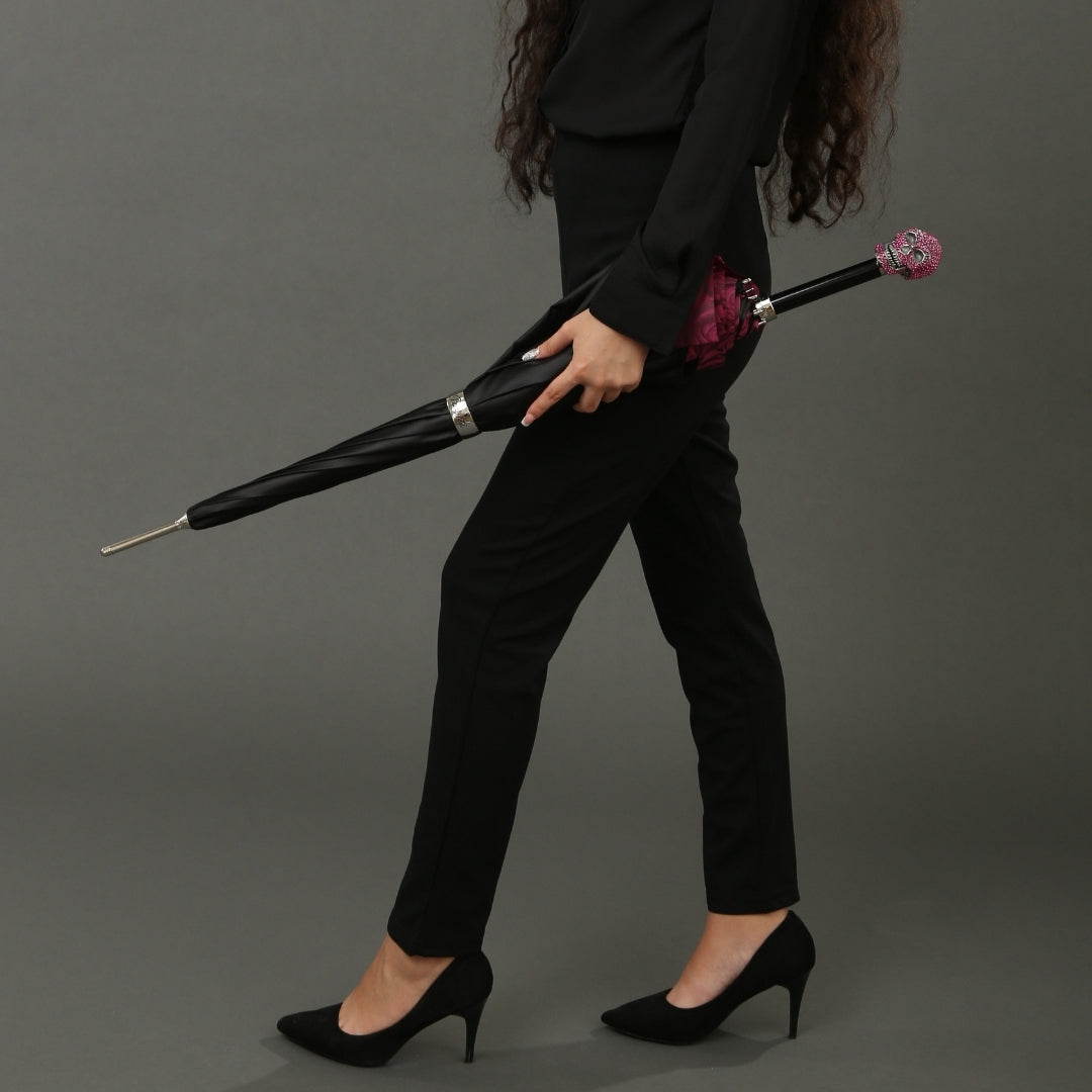 The girl is holding an umbrella with a skull with roses under the dome and a handle with Swarovski crystals - 3