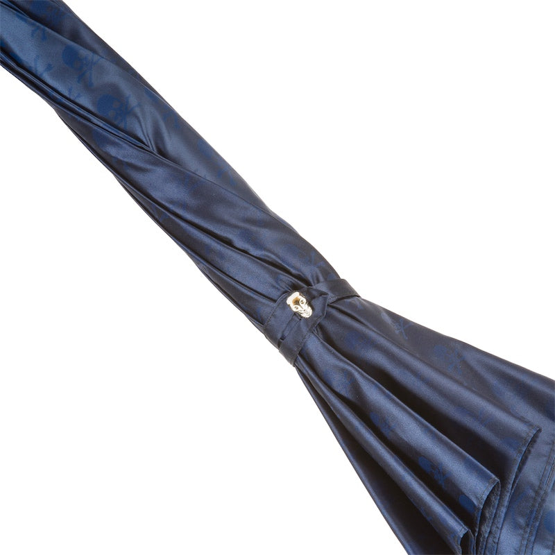 Blue umbrella with a skull in folded state