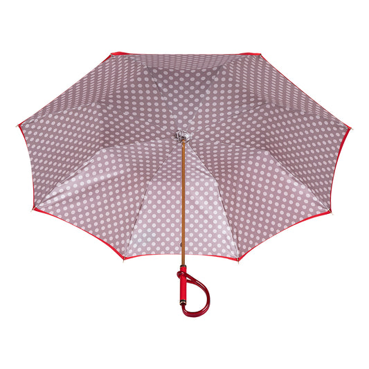 Interior view of Pasotti red umbrella with beige lining and white polka dots