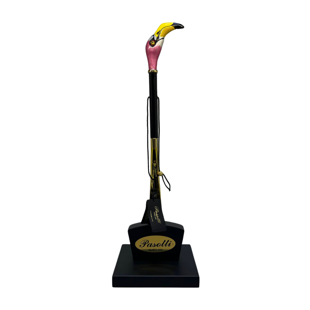 Flamingo shoe horn by Pasotti stands in a wooden stand
