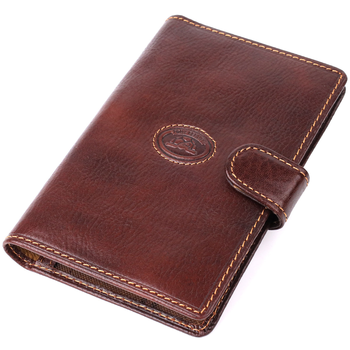 Tony Perotti Italico 1423A moro dark brown leather car document holder closed at an angle, showing the embossed oval emblem and the snap-tab closure