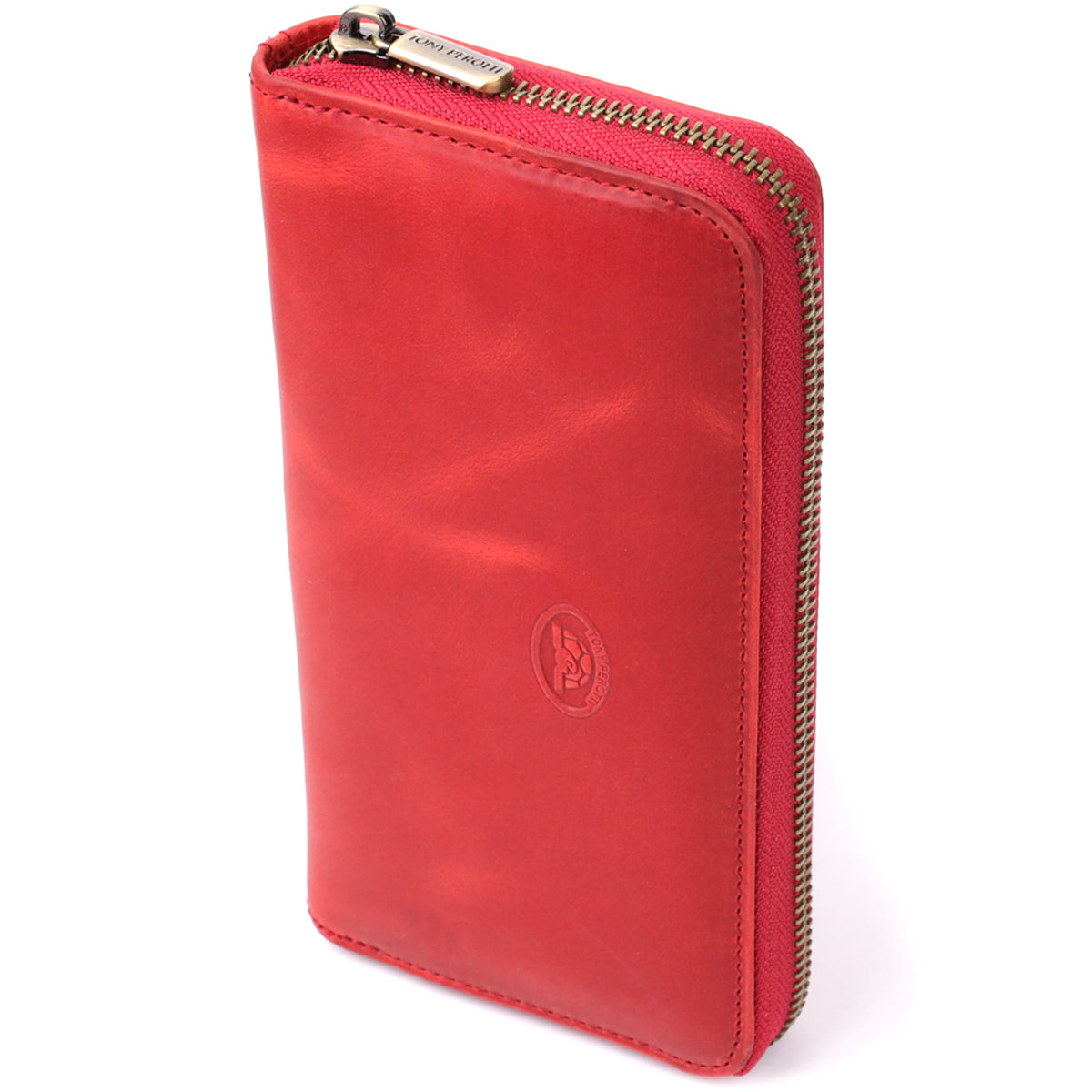 Tony Perotti Arno 2250 rosso women's red vintage-look leather zip-around wallet, standing at an angle — embossed oval Tony Perotti emblem and branded zip puller