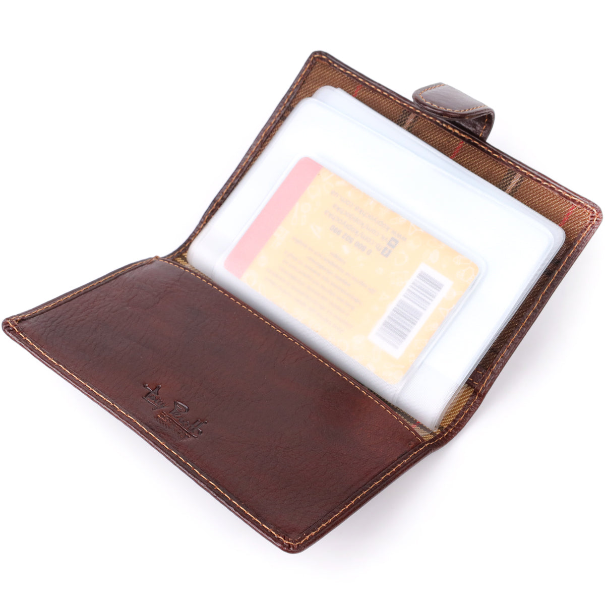 Tony Perotti Italico 1423A moro document holder opened wide — a card in a removable clear sleeve on the right, plain leather panel with the embossed Tony Perotti logo on the left