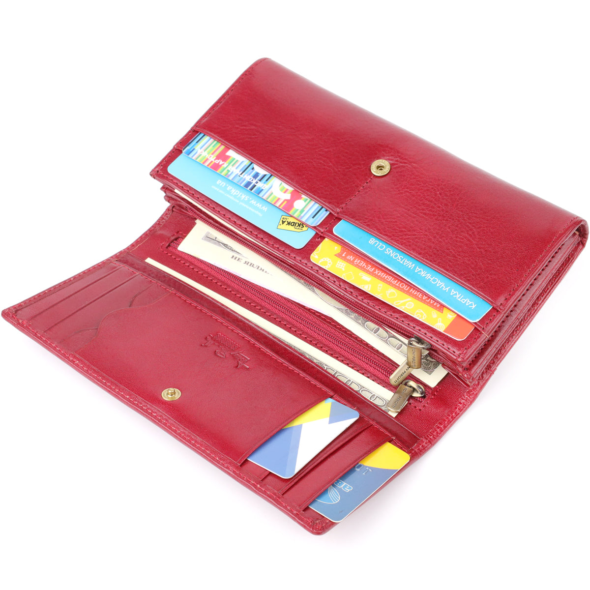 Tony Perotti Italico 1911 rosso red leather wallet open and filled — loyalty and discount cards in the slots, a layered zip pocket with banknotes and a branded zip puller