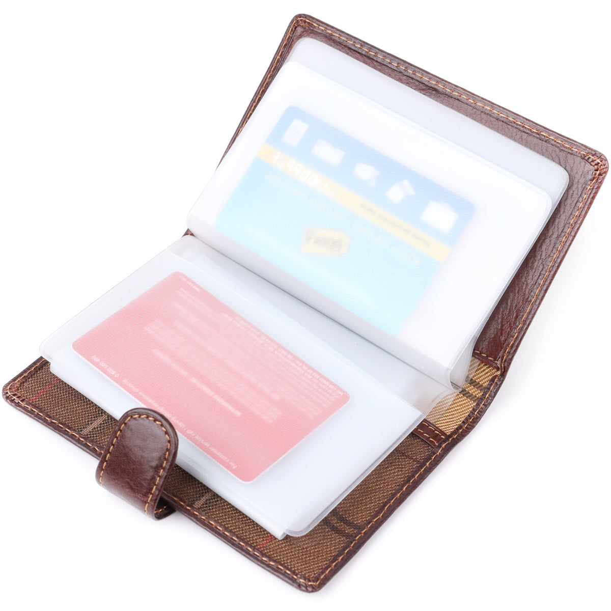 Tony Perotti Italico 1423A moro document holder opened flat, showing two cards held in the removable clear insert booklet against the checked lining