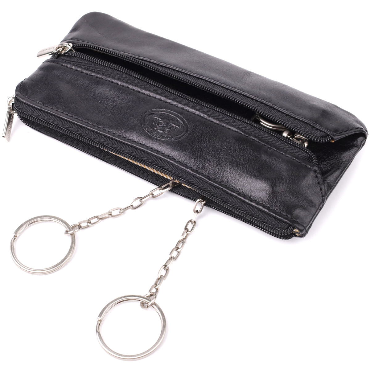 Tony Perotti Italico 2686 nero black leather key case open — two key rings on chains in the main compartment, embossed emblem, second zip compartment alongside