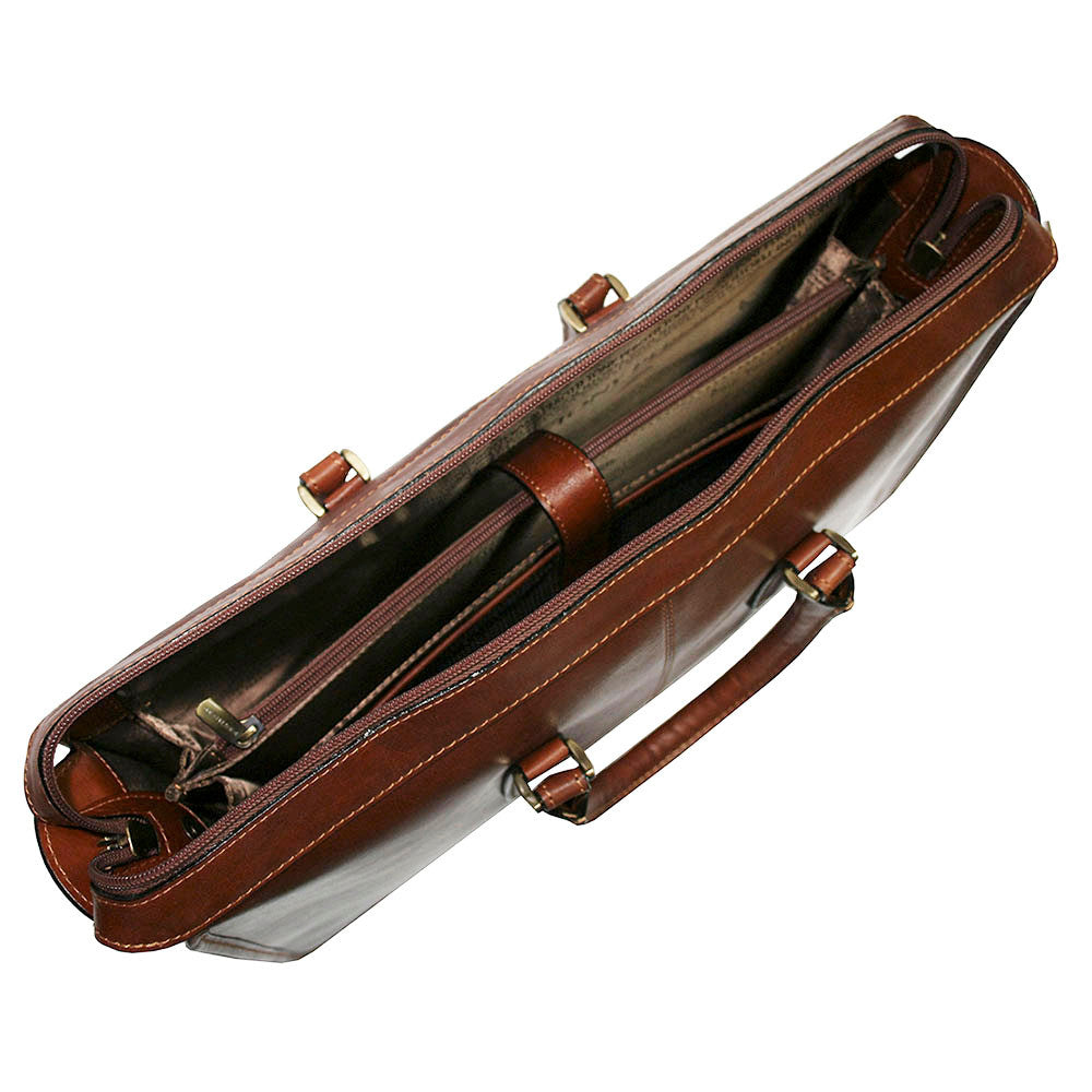 Inside the Tony Perotti Italico 8098 cognac briefcase — two zipped compartments divided by a zip pocket and the Tony Perotti printed lining