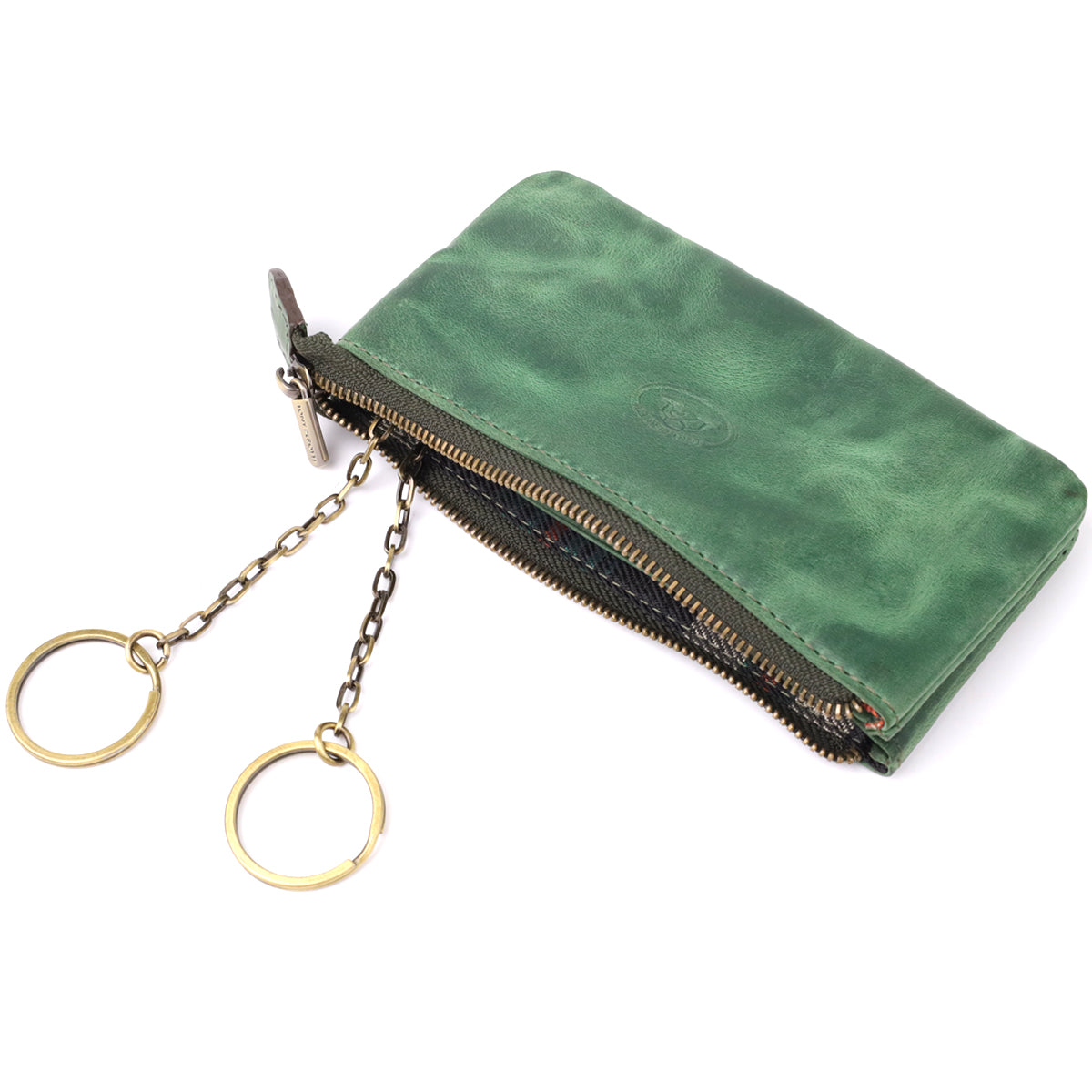 Tony Perotti Arno 3350 deep green key case open close-up — tartan-check lining, two brass key rings and the Tony Perotti hologram label on a leather tab