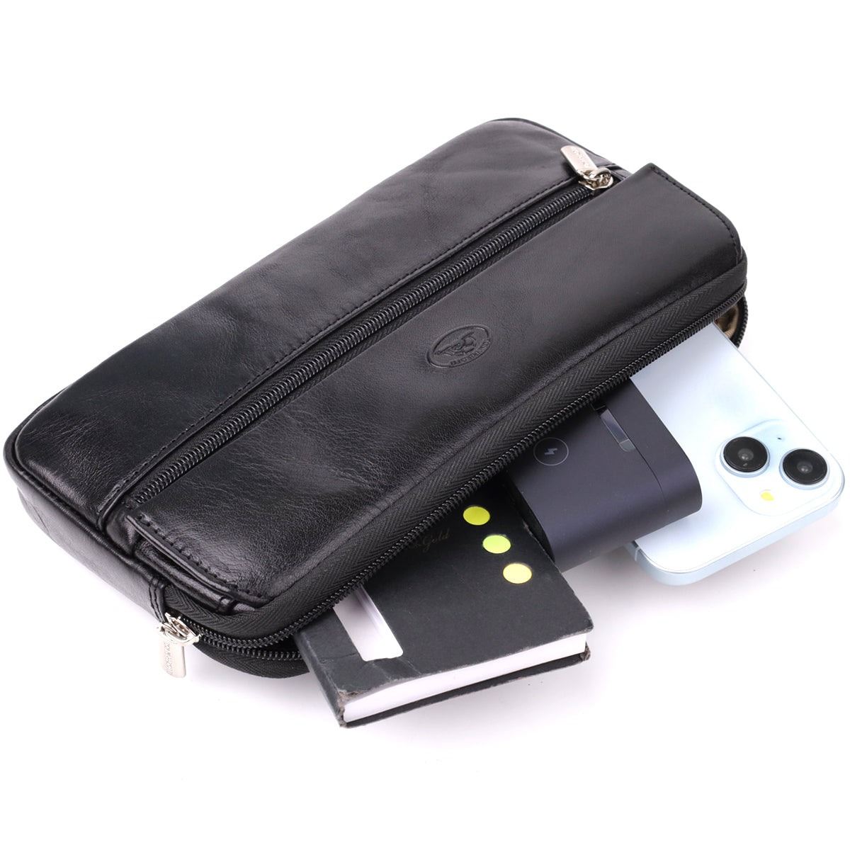 Tony Perotti Italico 9405 nero black leather clutch open, showing a phone, a power bank and a small notebook fitted inside