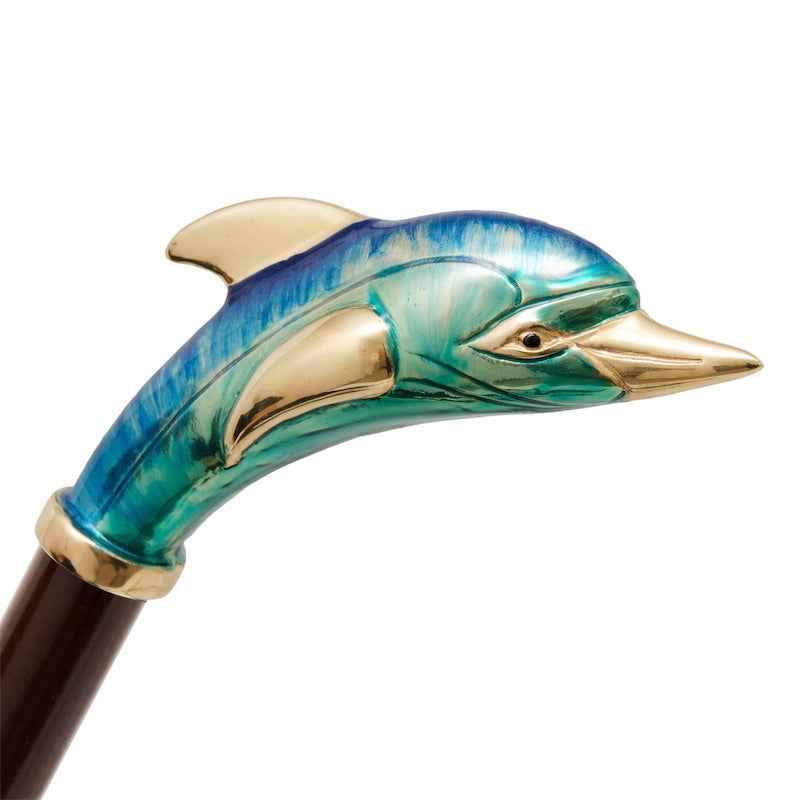 Blue and turquoise enameled dolphin with gold-tone fins and snout, in profile