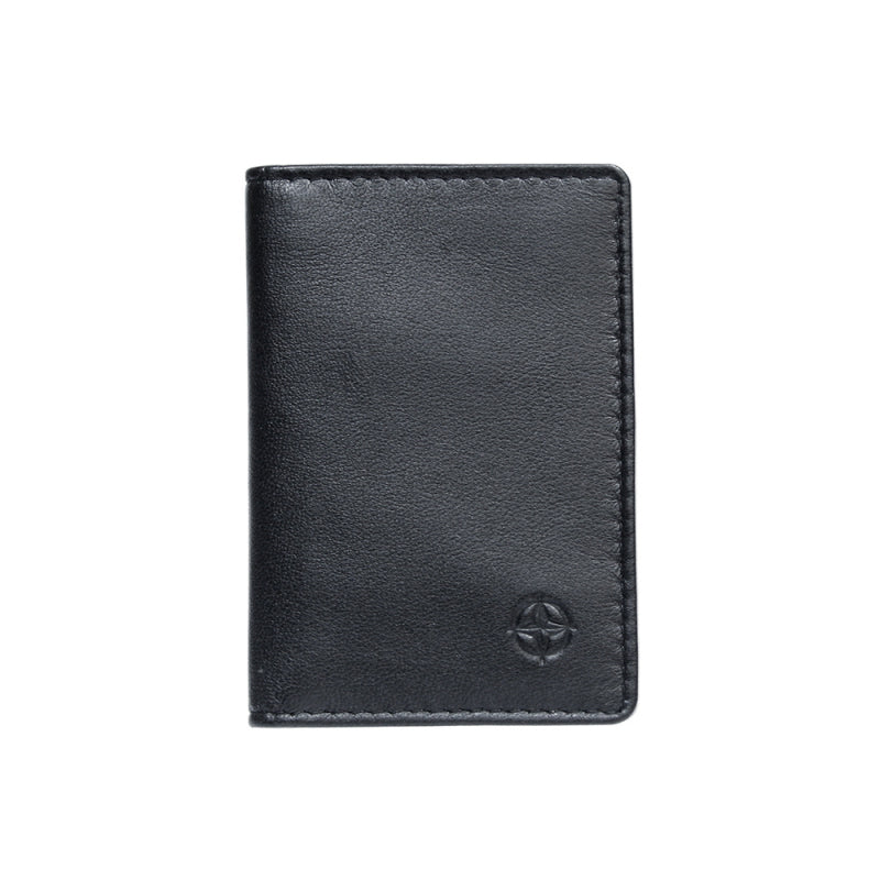 Tony Perotti Cortina 5004 nero — the black leather business card holder closed, with the embossed compass rose on the front