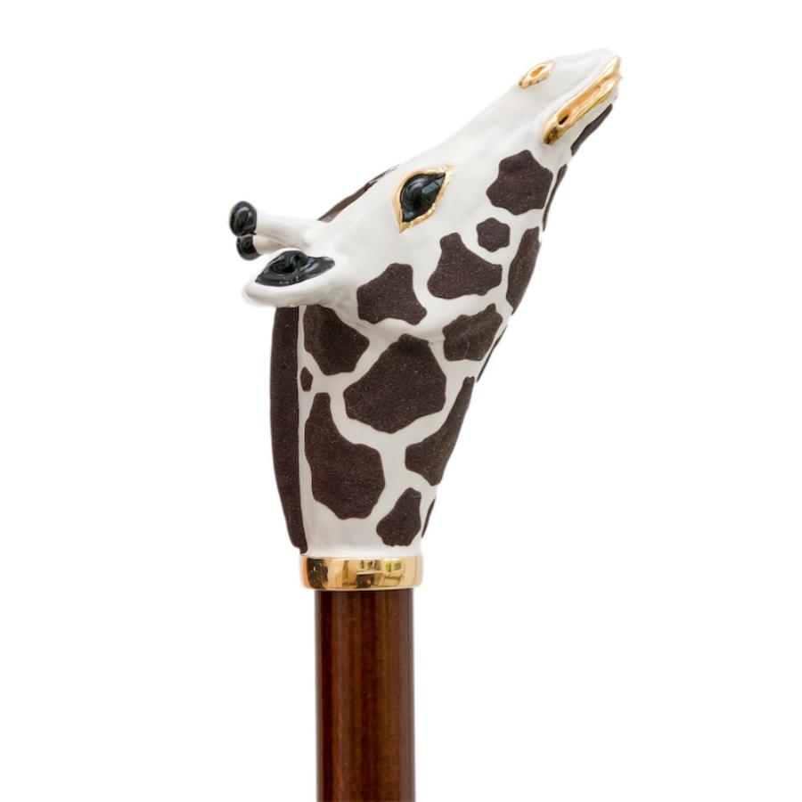 Giraffe head with dark brown patches above a gold-tone collar, handcrafted in Italy