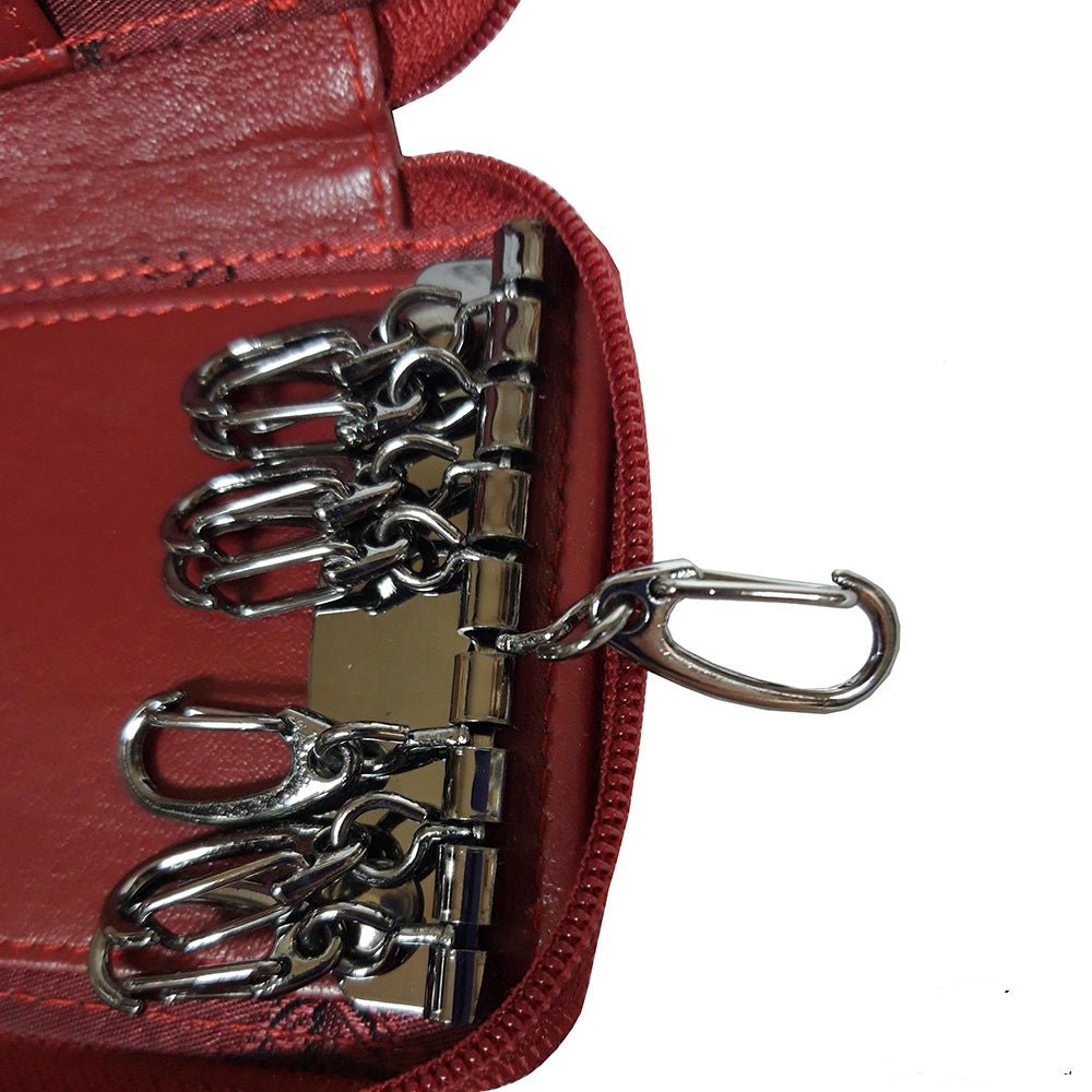 Tony Perotti Cortina 5026 rosso — close-up of the snap hooks on the metal bar against the red leather lining