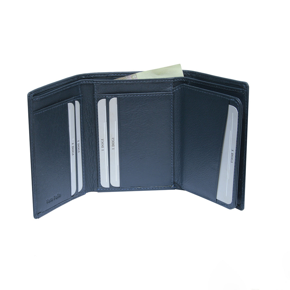 Tony Perotti Cortina 5063 navy opened out — card slots across the panels and a banknote in the compartment behind