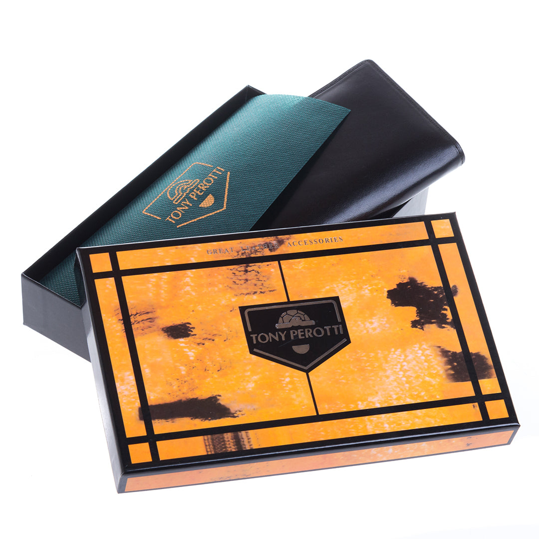 Tony Perotti Italico 2770 nero black leather flap wallet lying in the open printed Tony Perotti gift box with the green cloth pouch