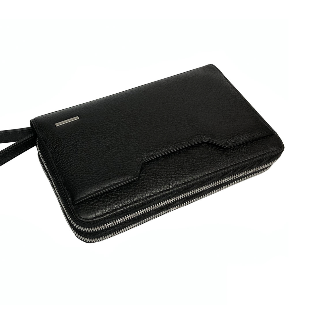 Black Tony Perotti 2886 clutch handcrafted in Italy — closed, with the leather wrist strap extended