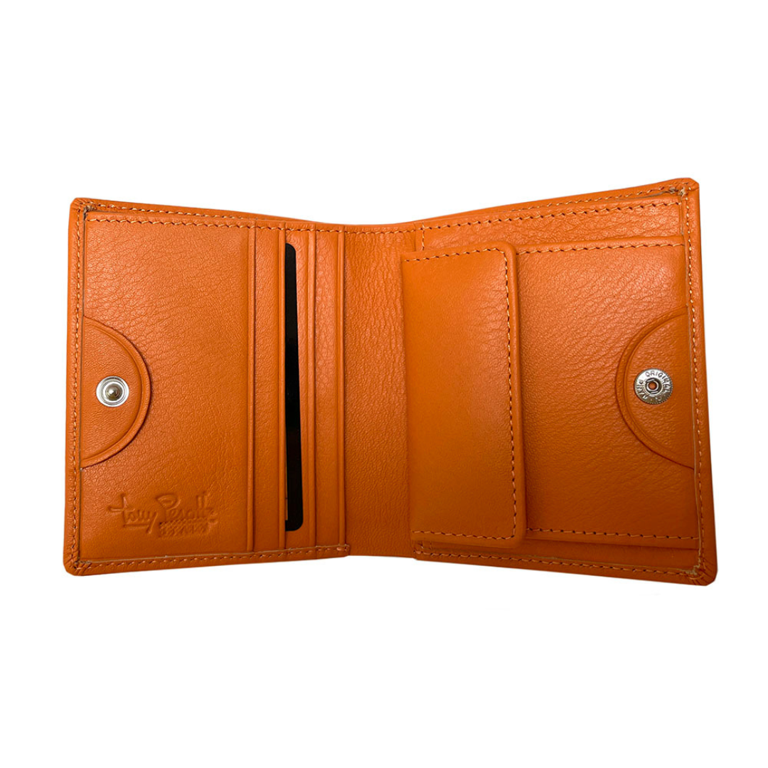Open Tony Perotti orange leather compact wallet on a white background