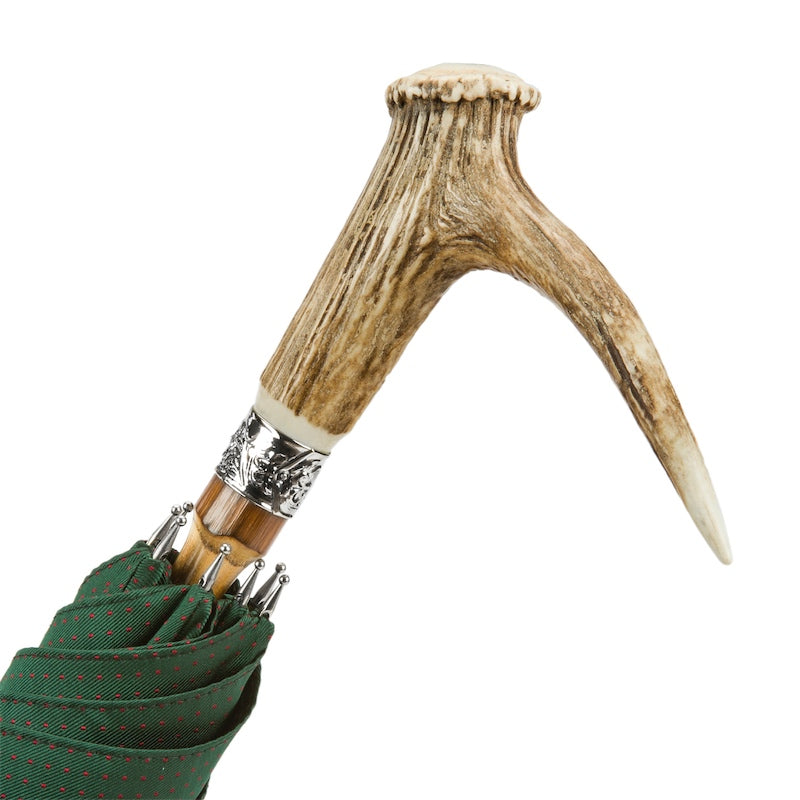 Deer antler handle on an engraved silver-tone collar, close-up, handcrafted in Italy