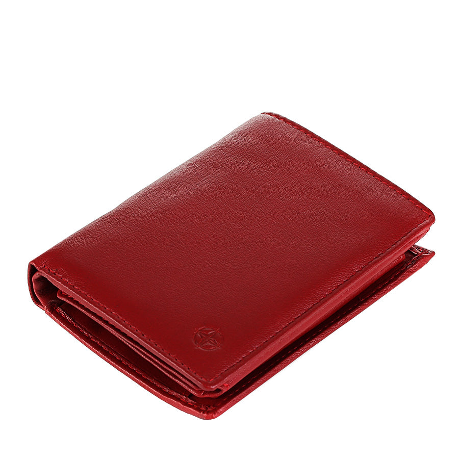 Red Tony Perotti Cortina 5031 wallet lying closed, seen from above — the fold and the layered edge