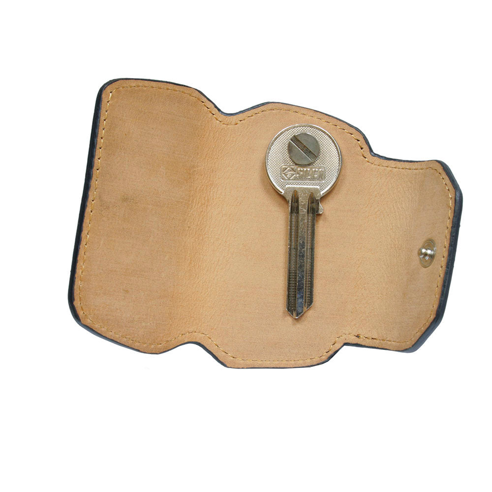 Tony Perotti Nevada KR-199 nero — opened flat: natural undyed leather inside and a key bolted to the screw post in the middle