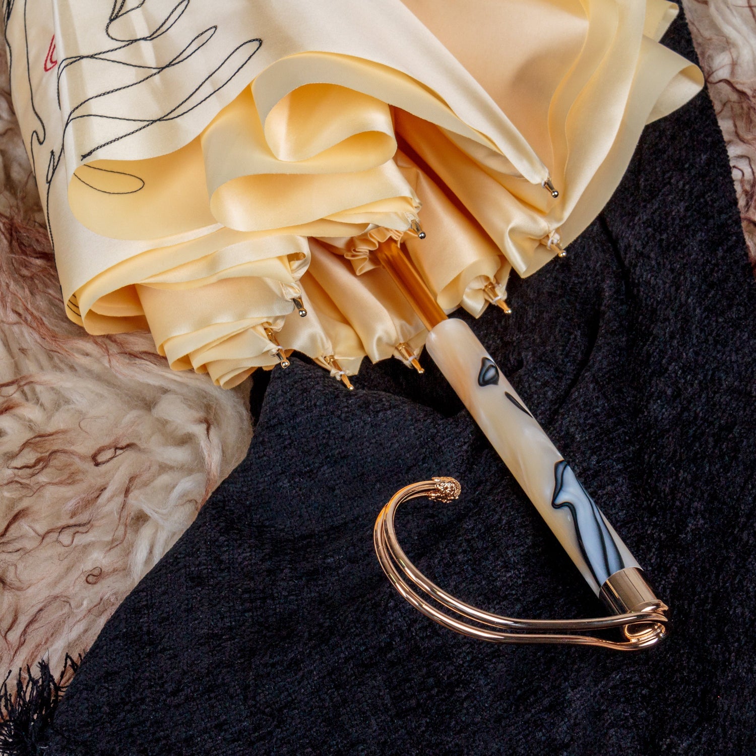 Decorative umbrella with artistic design on a textured surface