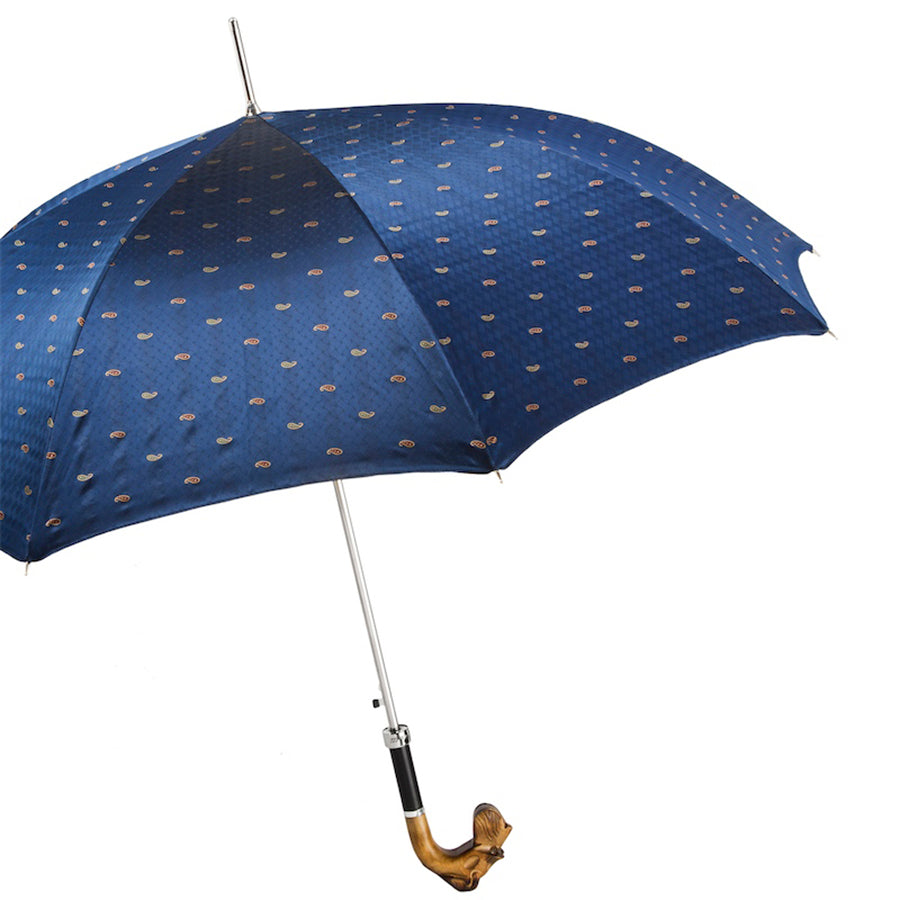 Open blue paisley umbrella from the side with silver-tone shaft and carved schnauzer handle
