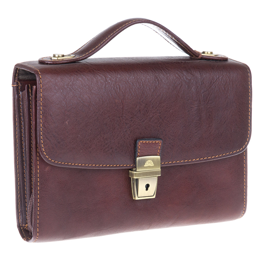 Angled view of the dark brown Italico 9337 clutch — three-section body, clasp lock and contrasting stitching