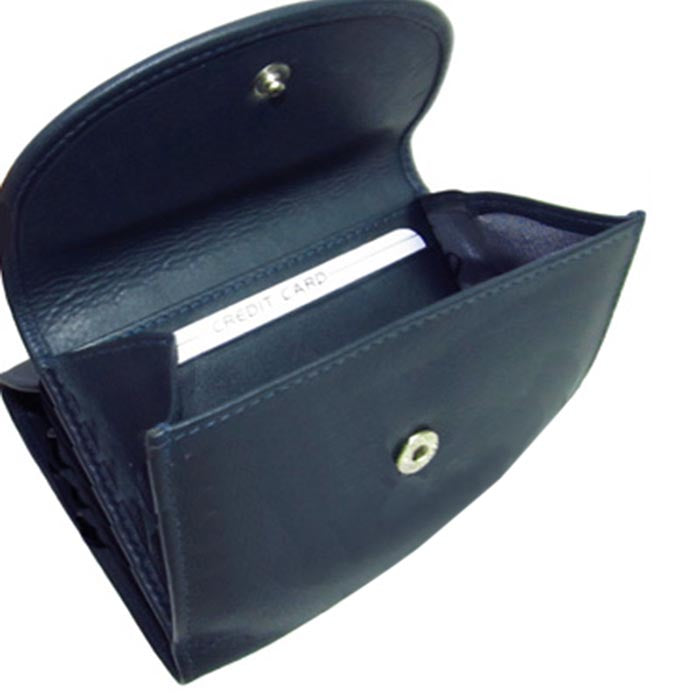 Tony Perotti Cortina 5055 navy opened at an angle — the flap raised, a card in the slot and the coin section behind