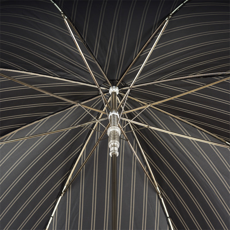 Underside of the striped canopy with eight silver-tone ribs