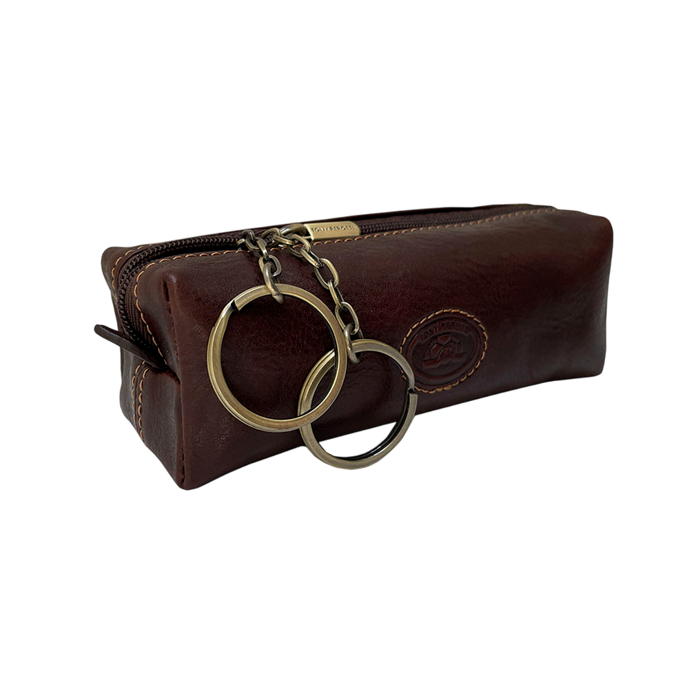 Dark brown leather key pouch, angled view with contrast stitching and brass key rings — Tony Perotti Italico 3297 moro