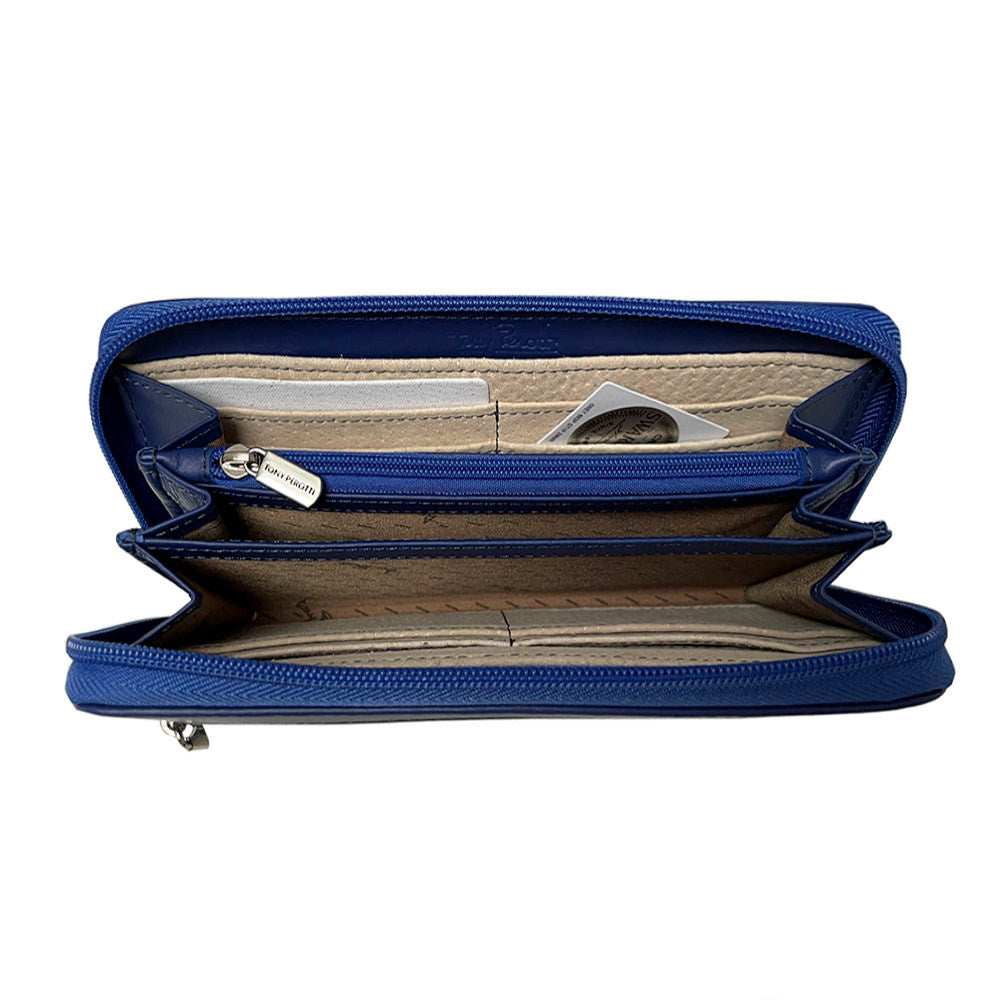 Interior of the blue Swarovski 3160 wallet with banknotes lying flat