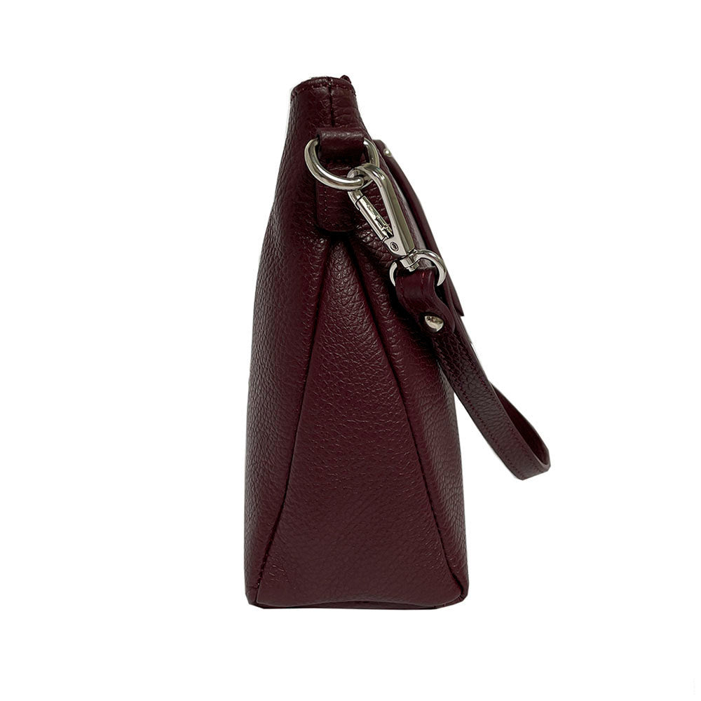 Side of the Tony Perotti Borsa CA01A-18BO burgundy leather bag, showing the soft unstructured body and the silver clip on the strap ring