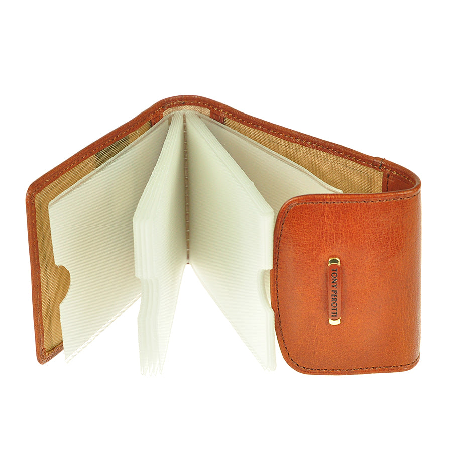 Tony Perotti Topkapi 1703 ambra — opened, showing the fan of clear files and the leather pocket