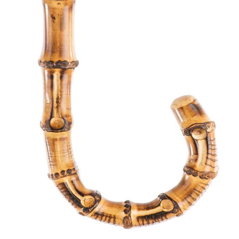 Bamboo crook handle with natural nodes, close-up, handcrafted in Italy