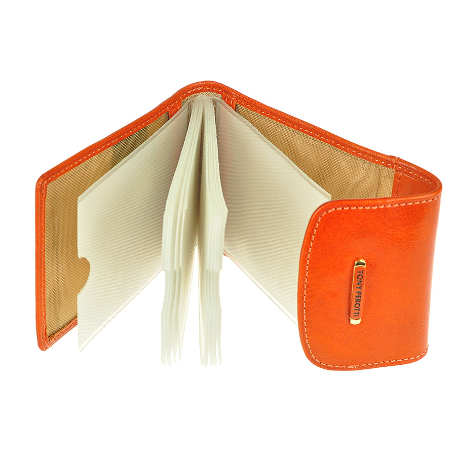 Tony Perotti Topkapi 1703 mandarino — opened, showing the fan of clear files and the leather pocket