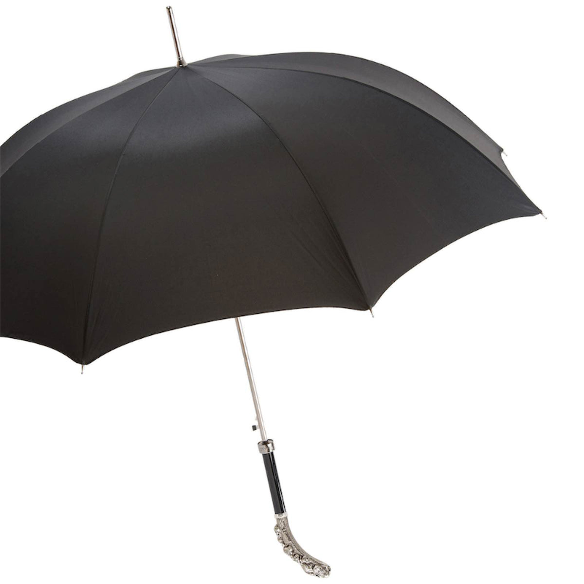 Open black umbrella from the side with silver-tone shaft and skull handle