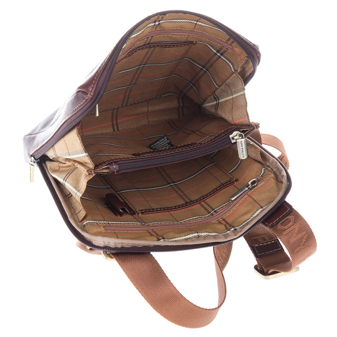 The dark brown Italico 9137-20 opened wide on its three-side zip — two sections with zip pockets and a pen loop