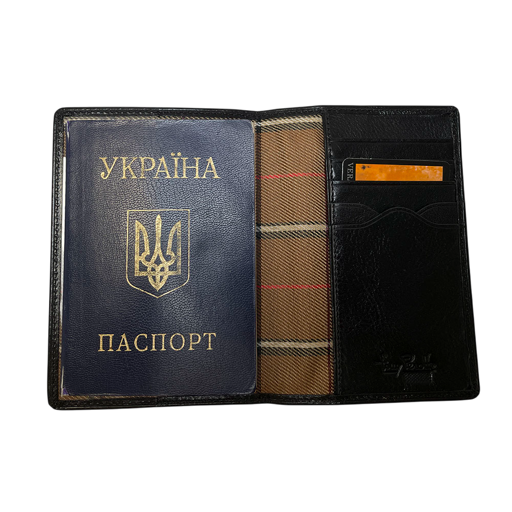 Tony Perotti Italico 3614 nero passport cover opened with a passport in the left-hand transparent pocket